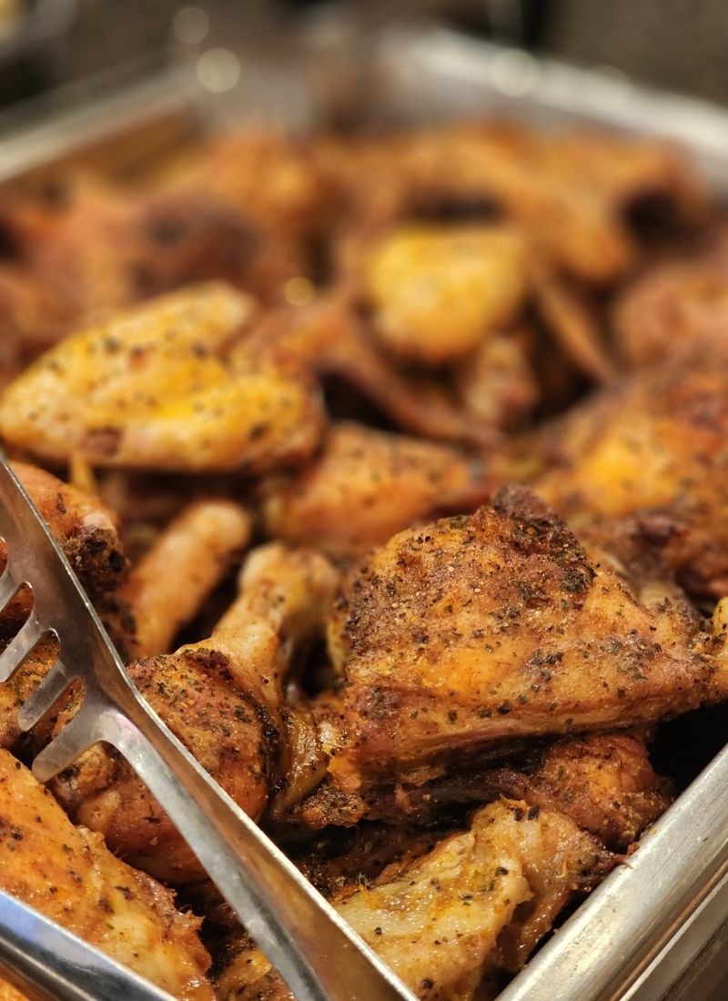 Professional off-site catering in Michigan by The Mirage featuring an elegant buffet spread at a private event