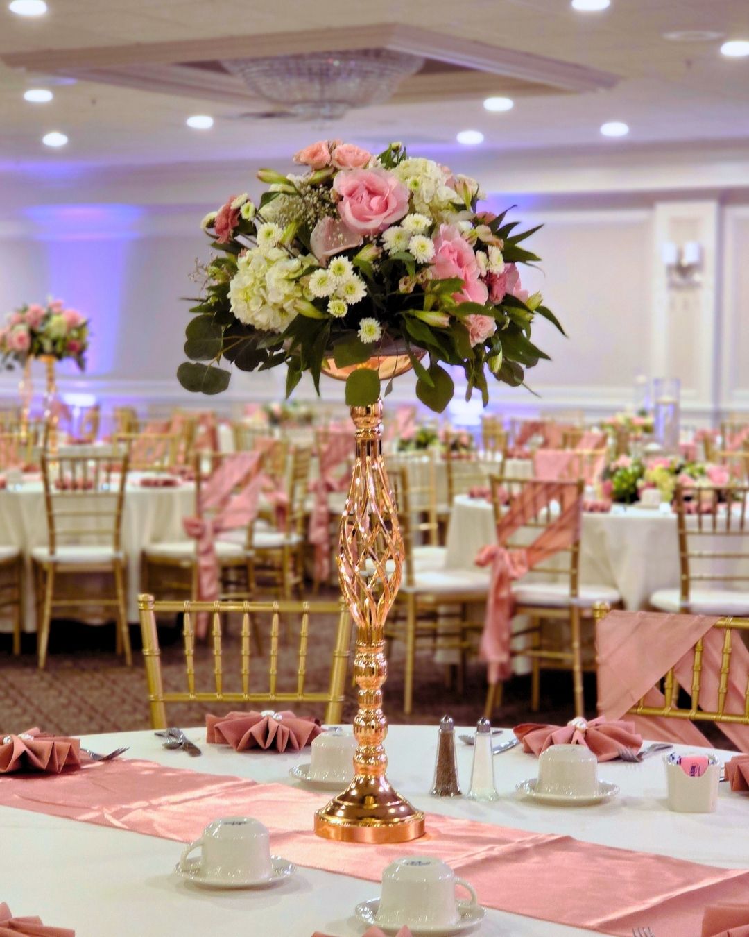 Luxury Sweet 16 décor by Bridal Insignia Events at the perfect Sweet 16 venue in Michigan featuring cascading florals and custom stage designv